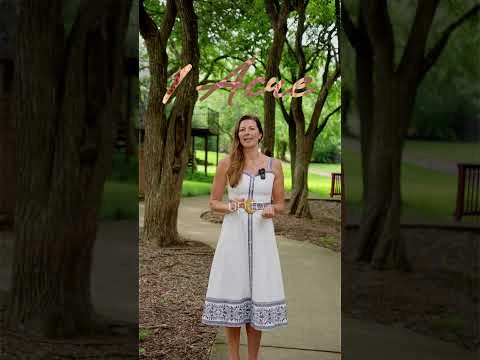 Agent presenting on a tree-lined path in an FLM-filmed real estate video