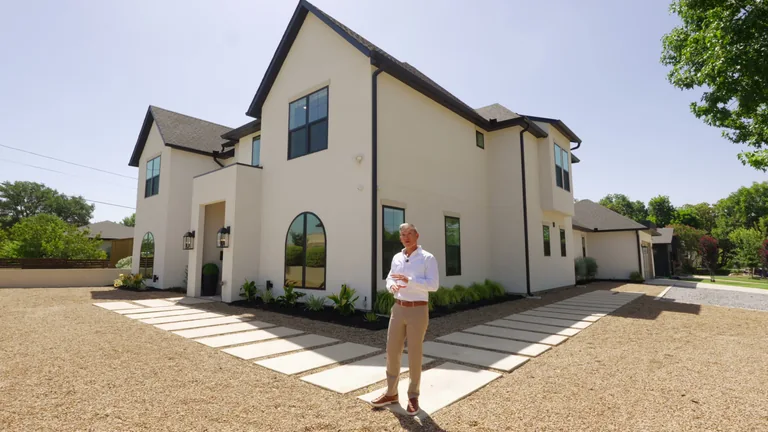 Agent introducing the home at 3860 Walnut Hill Lane in Dallas in the FLM property film