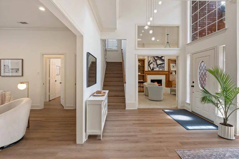 Entry hall and staircase connecting the main living spaces — FLM media library example
