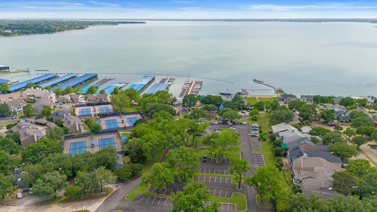Aerial view of a waterfront residential community and marina — FLM media library example