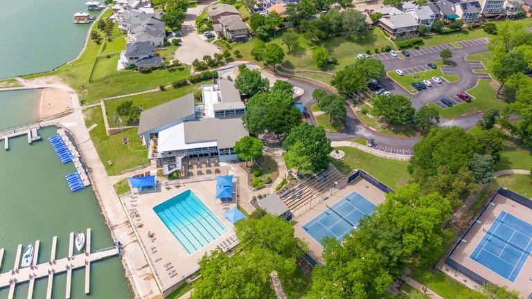 Aerial view of a recreation center, swimming pool and neighborhood — FLM media library example
